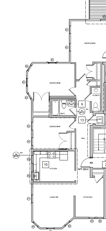 Large living space with kitchen alcove, breakfast bar, and a closet downstairs